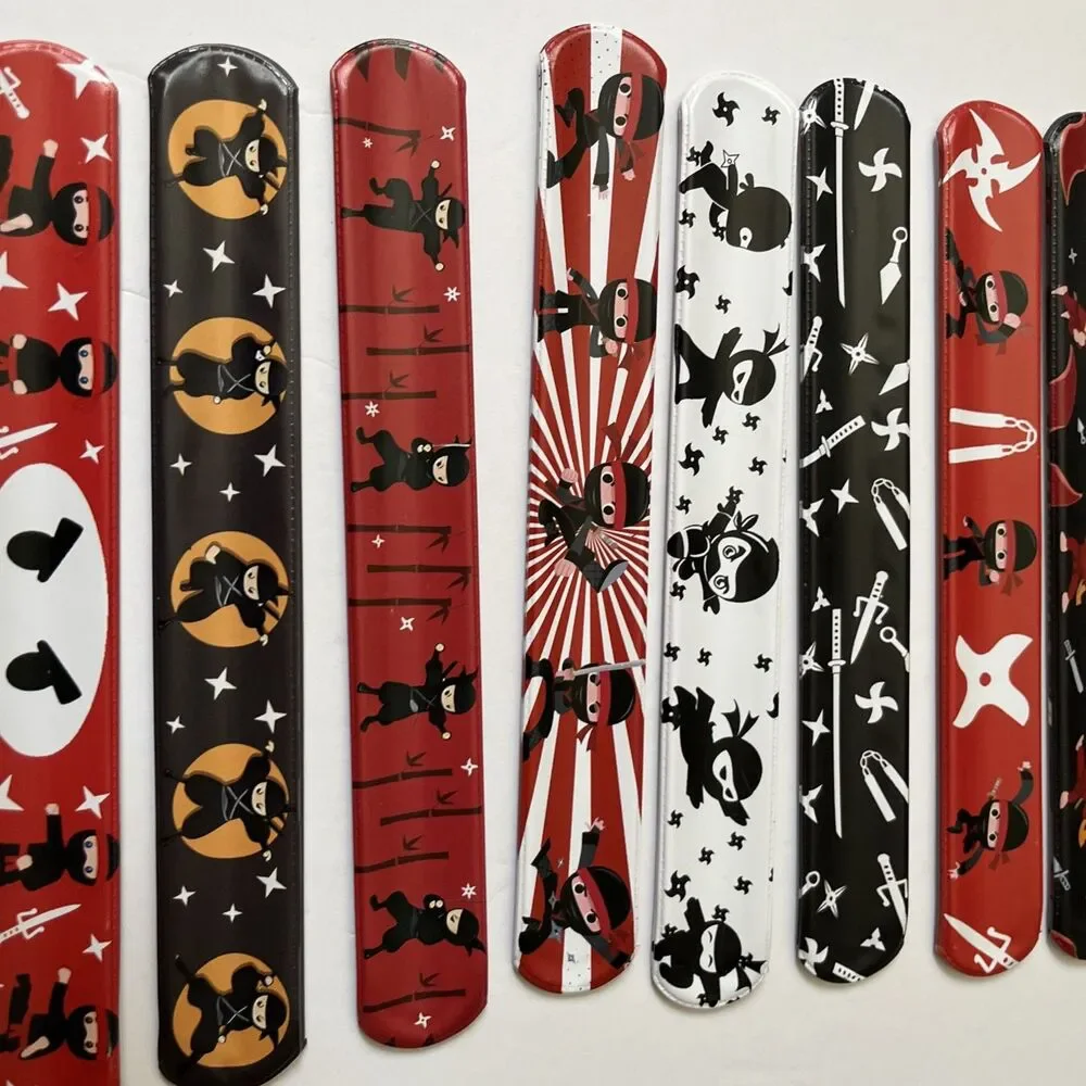 Ninja Slap Party Favor Bracelets 48 Pack Treasure Box 12 Designs 4 Each Design